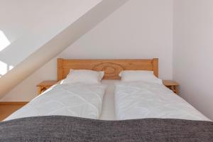 Postel nebo postele na pokoji v ubytování Guest House Štruc