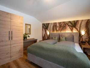 Postel nebo postele na pokoji v ubytování Gartenhaus Zur Kröllin