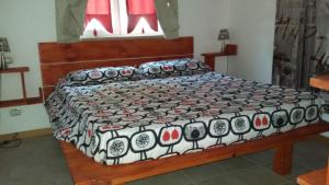 Cama ou camas em um quarto em Oca Giuliva