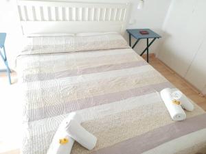 Llit o llits en una habitació de Hola! - Sitges Centric Apartment