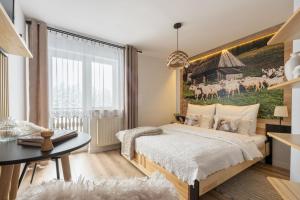 Posteľ alebo postele v izbe v ubytovaní Pokoje Widokowe Sywarne