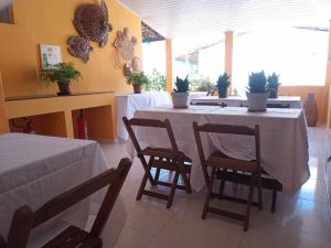 Reštaurácia alebo iné gastronomické zariadenie v ubytovaní Pousada Grão de Areia Beira Mar