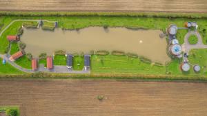 an overhead view of a park with a yard at Lakeside Fishing Lodges in Boston