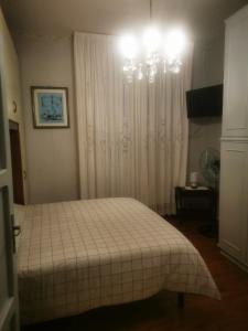 A bed or beds in a room at Trevi al Centro