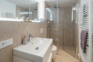 Baðherbergi á Haus Noena - Wohnung 7 Inselschatz +21 mynd