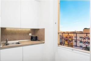 Η κουζίνα ή μικρή κουζίνα στο 2mn Monaco - Hypercentre - Appartement rénové - BI +22 φωτογραφίες