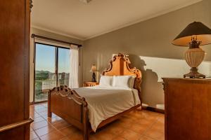 Кровать или кровати в номере Bougainvillea 2306 - Luxury Condo Reserva Conchal