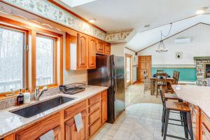 A kitchen or kitchenette at Bennington Home with Deck about 5 Mi to Bald Mountain!