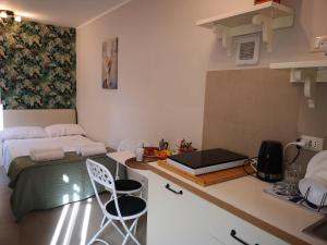 A kitchen or kitchenette at Marilor Apartments