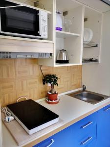 A kitchen or kitchenette at Marilor Apartments