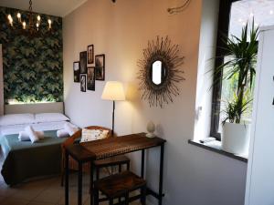 A bed or beds in a room at Marilor Apartments