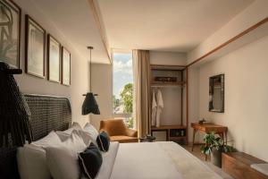Postel nebo postele na pokoji v ubytování Hotel Sureño Yucatan + 37 fotografií
