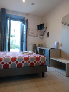 Posteľ alebo postele v izbe v ubytovaní Villa Gelsomino Garden