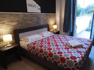 Posteľ alebo postele v izbe v ubytovaní Villa Gelsomino Garden