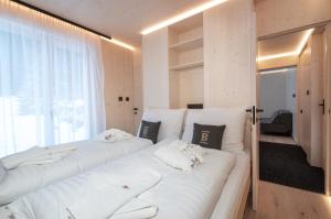 Posteľ alebo postele v izbe v ubytovaní Hotel Björnson & Björnson TREE HOUSES Jasná