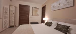 Postel nebo postele na pokoji v ubytování B&B Monastero
