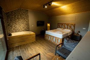 Cama o camas de una habitación en Taş Mahall Luxury Hotel