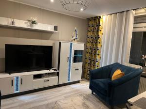 TV a/nebo společenská místnost v ubytování Apartament CITY Ustroń