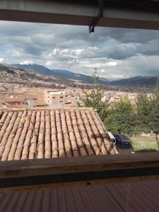 a view from a window of a roof at Casa Salkantay Mini Departamento in Cusco