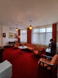 Posezení v ubytování Hotel Perla Oltului