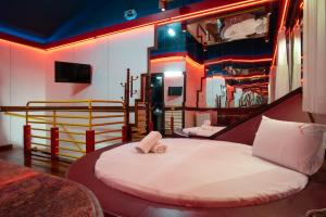 Giường trong phòng chung tại Motel Fantasy 5