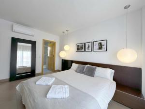 Ein Bett oder Betten in einem Zimmer der Unterkunft Casa Jimena