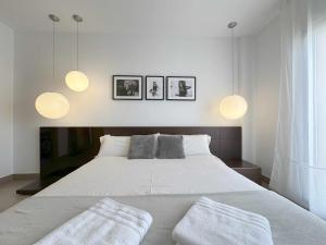 Ein Bett oder Betten in einem Zimmer der Unterkunft Casa Jimena