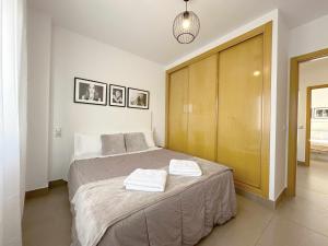 Ein Bett oder Betten in einem Zimmer der Unterkunft Casa Jimena