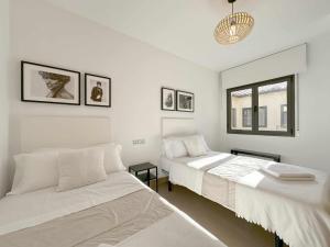 Ein Bett oder Betten in einem Zimmer der Unterkunft Casa Jimena