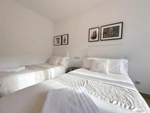 Ein Bett oder Betten in einem Zimmer der Unterkunft Casa Jimena
