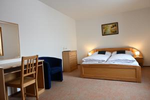 Posteľ alebo postele v izbe v ubytovaní Hotel Eufória