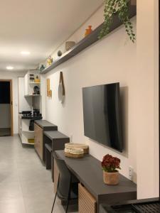 Μια τηλεόραση ή/και κέντρο ψυχαγωγίας στο FLAT ECO RESORT PRAIA DOS CARNEIROS