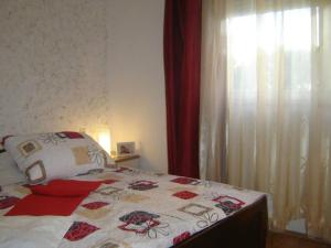 Postel nebo postele na pokoji v ubytování Apartment Lala