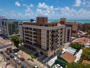 an overhead view of a large building in a city at Apto Novo PraiaTambaúCabo Branco in João Pessoa