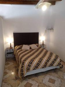 Ein Bett oder Betten in einem Zimmer der Unterkunft Departamento Zapata 5ta Mendoza