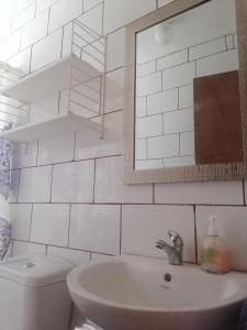 Phòng tắm tại El Refugio de la Estancia
