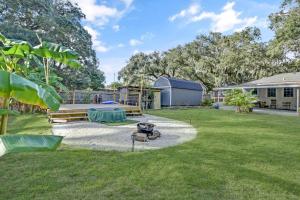 Κήπος έξω από το Sago Palm Cottage