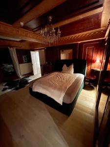 Postel nebo postele na pokoji v ubytování Fürstliches Appartement in Reith bei Kitzbühel