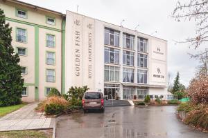 a van parked in front of a building at Spacious apartment in perfect location 52m2 in Plzeň