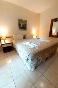 Ein Bett oder Betten in einem Zimmer der Unterkunft Pousada e SPA Canto do Mar