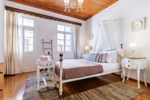Ένα ή περισσότερα κρεβάτια σε δωμάτιο στο villa Yiannoula