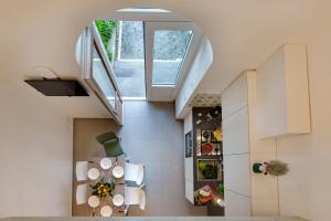 an overhead view of a kitchen and dining room in a house at Holidays Homes The dream in Sant'Agnello