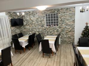 Et tv og/eller underholdning på Căsuța de lângă pădure