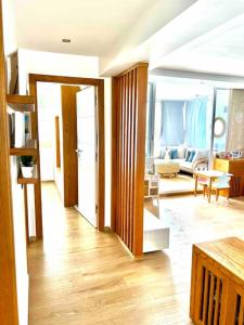 a room with a living room and a living room with at Appartement pieds dans l’eau M’diq in M'diq +14 photos