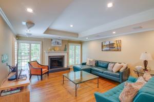 a living room with a couch and a table at Pool, Hot Tub and Outdoor Theater Franklin Retreat in Franklin