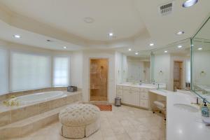 a large bathroom with a tub and a sink and a bath tub at Pool, Hot Tub and Outdoor Theater Franklin Retreat in Franklin +50 photos