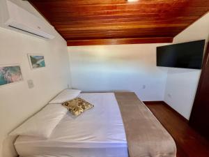 Cama o camas de una habitación en Acorde Com o Cenário Beira Mar - Coberturinha