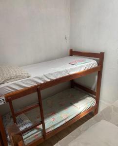 Cama ou camas em um quarto em Pousada House Nativa