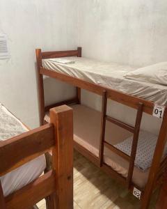Cama ou camas em um quarto em Pousada House Nativa