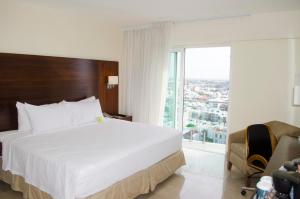 Katil atau katil-katil dalam bilik di Four Points by Sheraton Veracruz